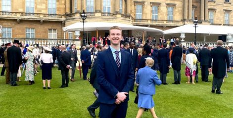Former policing student Tom at Buckingham Palace