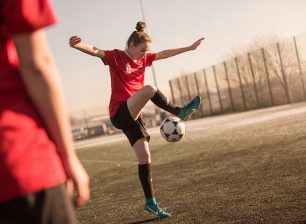 Women's football Academy player practicing