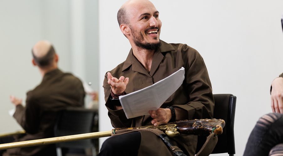 Adult performing arts student rehersing script