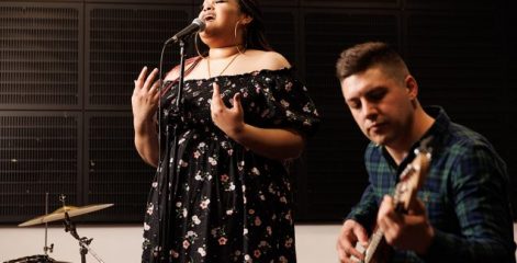 Music performance with a singer and guitarist