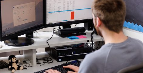 Student facing a computer screen