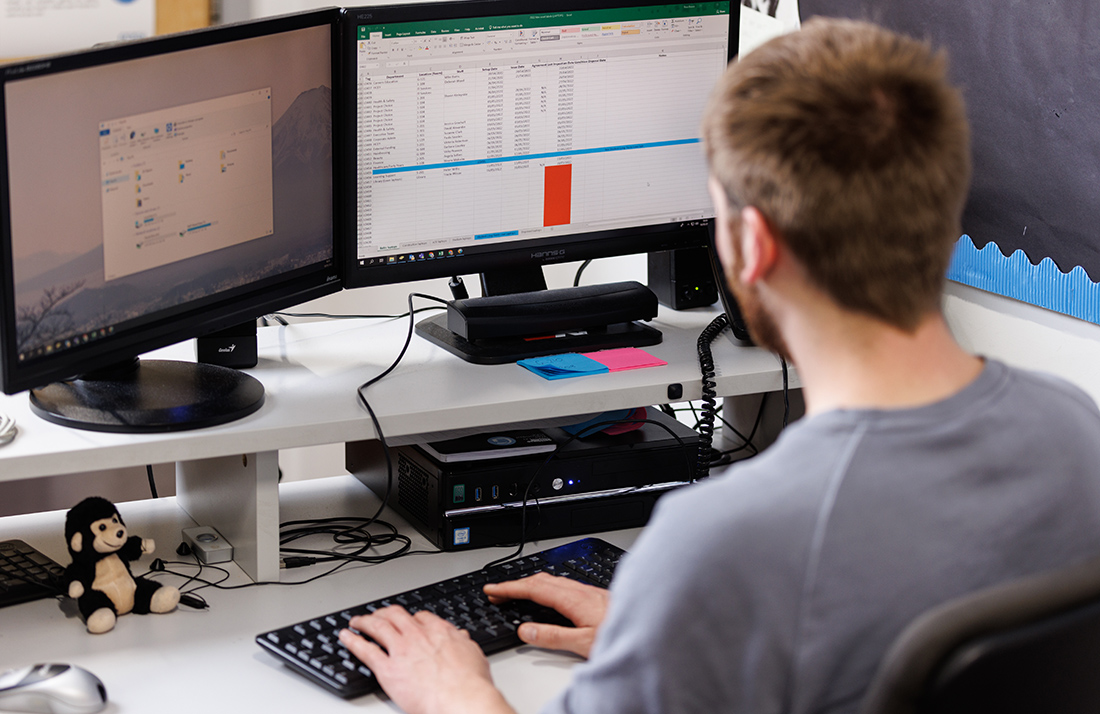 Student facing a computer screen