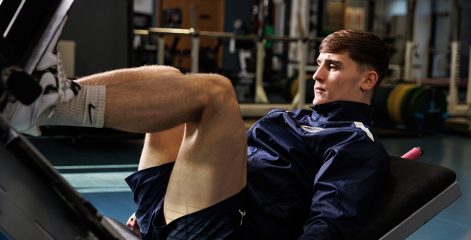 Student on weight machine