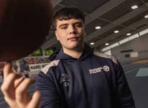 Basketball player spinning ball on finger