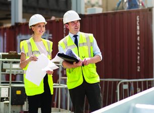 PlanBEE student working with their employer on construction site