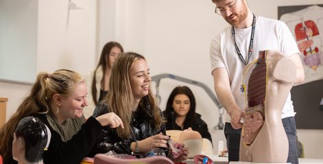 Teacher instructing students in classroom